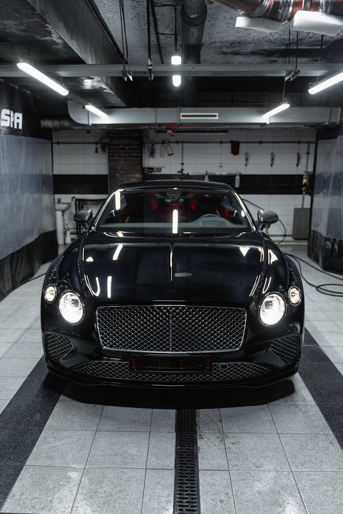 Stunning Bentley Continental GT in a garage, showcasing luxury and style.